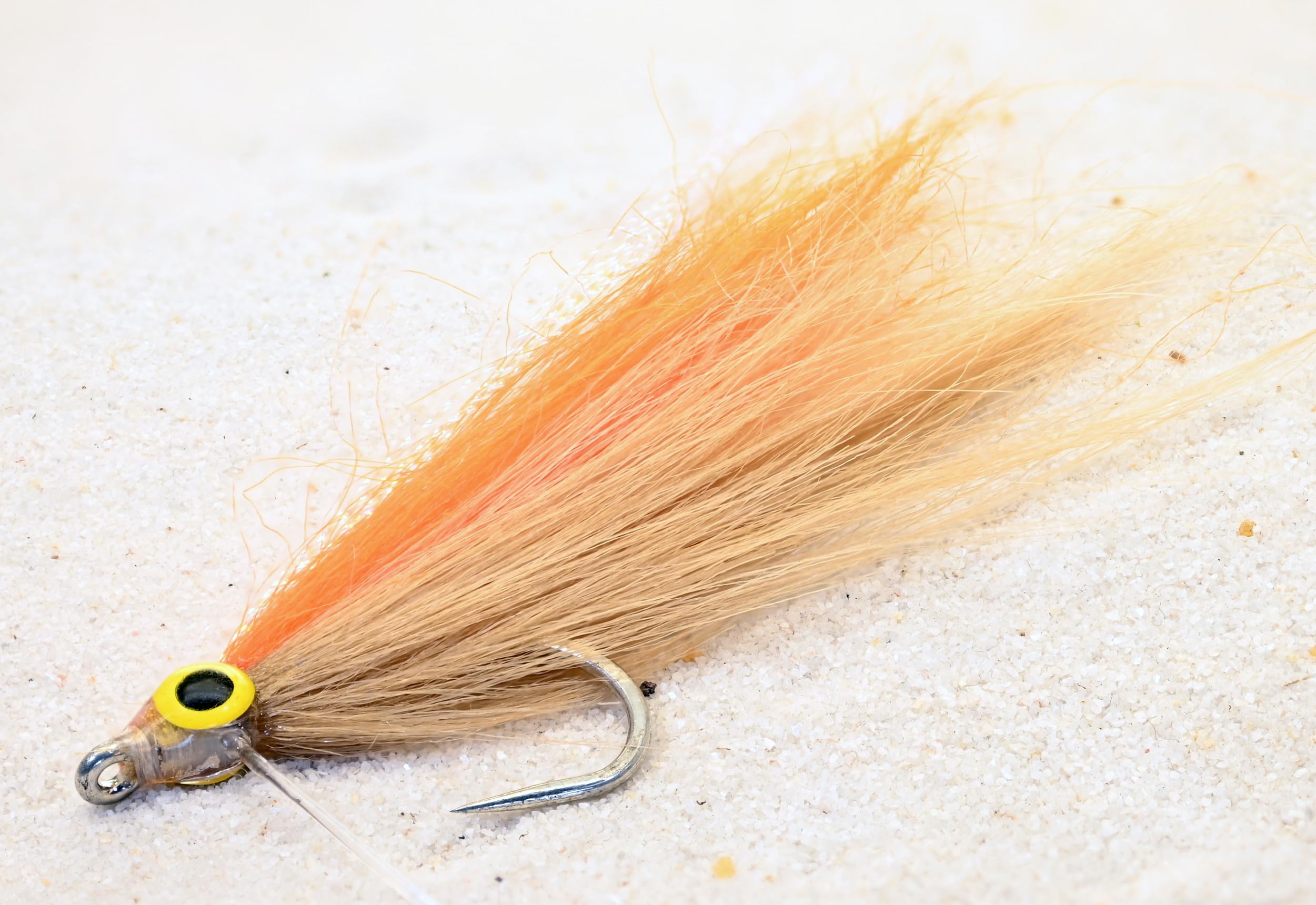 Region Fishing Cheat Code Fly with weed guard for versatile fishing in weedy waters.