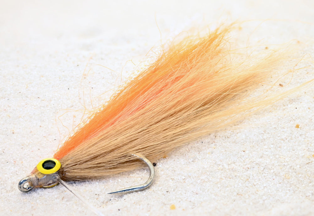 Region Fishing Cheat Code Fly with weed guard for versatile fishing in weedy waters.