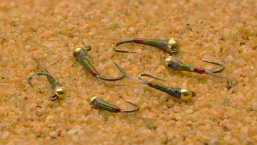 Region Fishing Hanak jig hook on Perdigon enables barbless penetration and solid hookups.