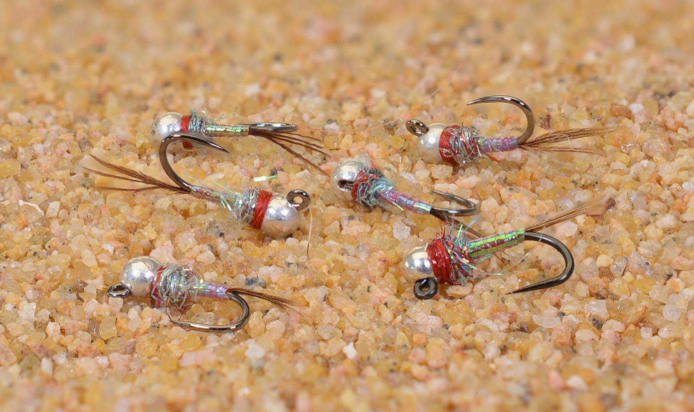 Region Fishing Rainbow Warrior tungsten bead jig fly with Hanak hooks improves casting and snag resistance.