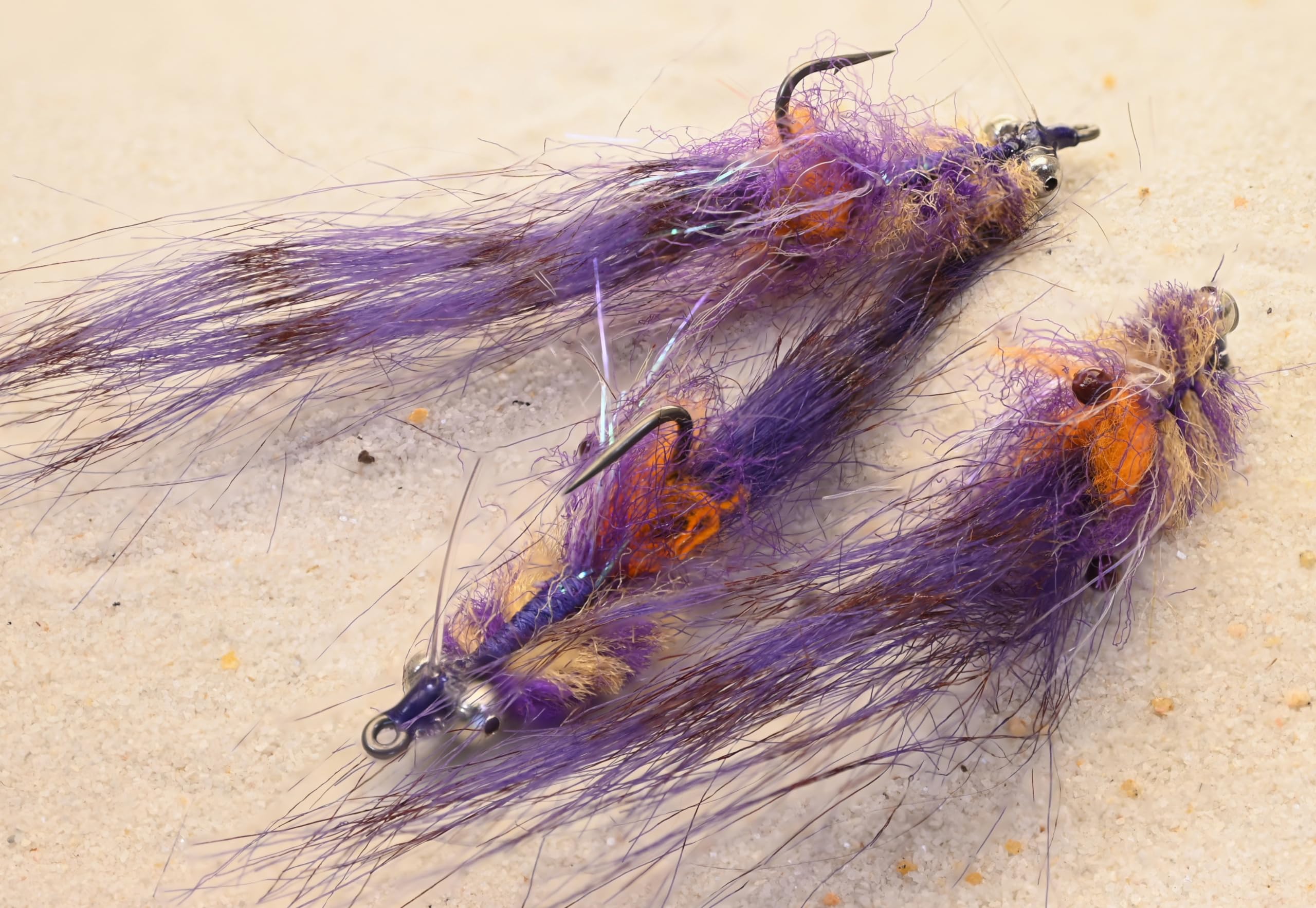 Region Fishing Redfish Crack Fly in purple hue, designed for easy cast and enticing strikes