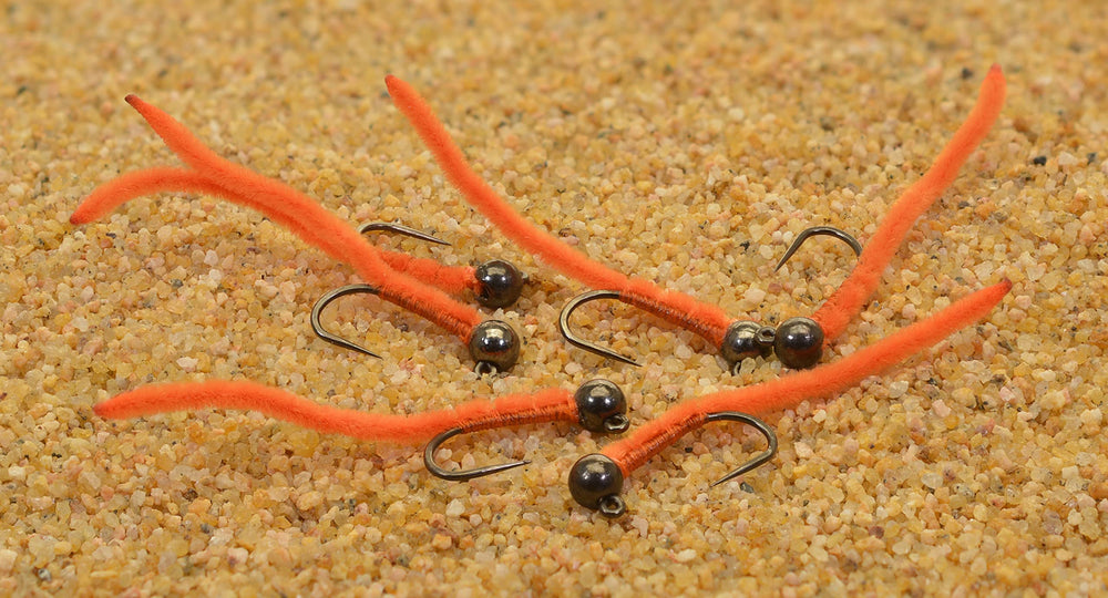 Region Fishing orange San Juan Worm Jig Head, showing jig hook design for reduced snags and better hookups