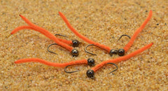 Region Fishing orange San Juan Worm Jig Head, showing jig hook design for reduced snags and better hookups
