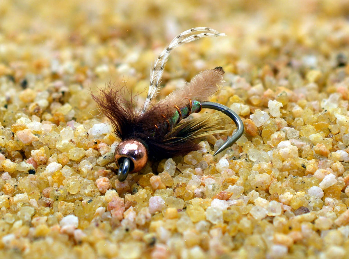 Region Fishing Tan Fox Poopah Nymph on a Mustad Heritage hook, ideal for trout in rivers