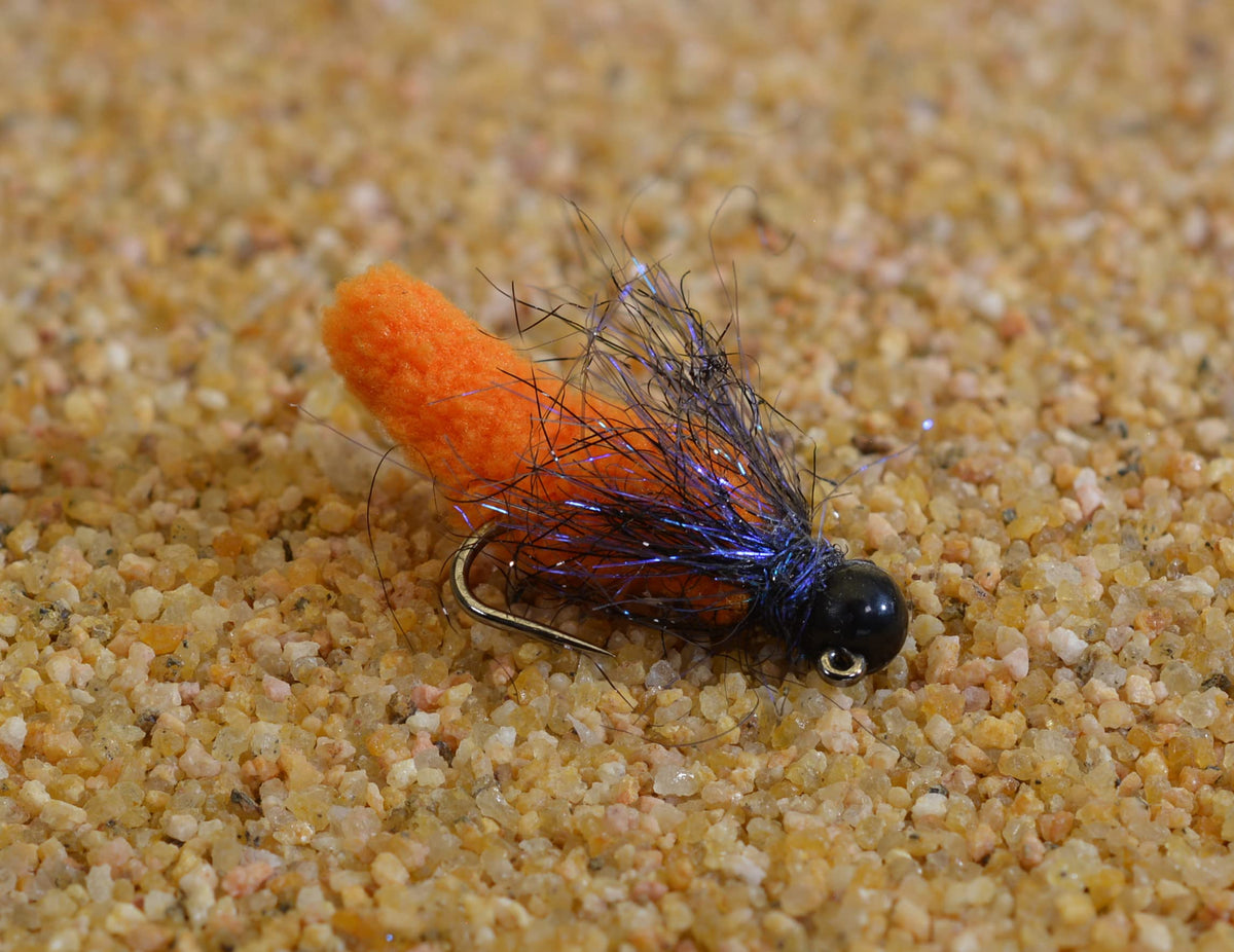 Region Fishing tungsten mop jig fly on orange hook for Euro Nymphing in fast flow