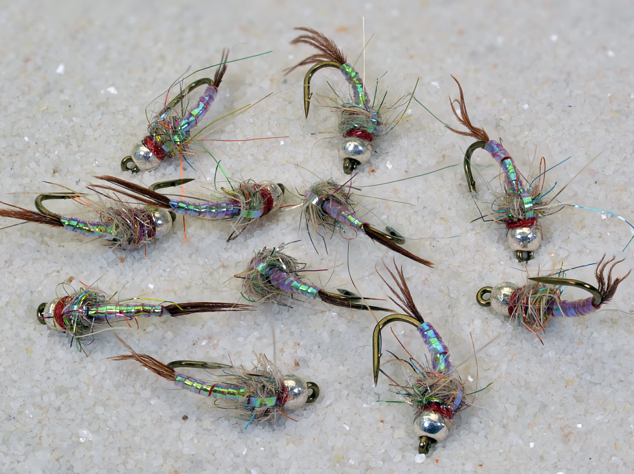 Region Fishing Rainbow Warrior Midge Nymph on Mustad Signature hook, ready for accurate casts.