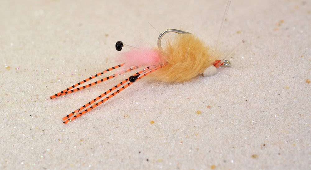 Region Fishing spawning shrimp fly on Mustad Duratin hook, ideal for bonefish bites in saltwater.
