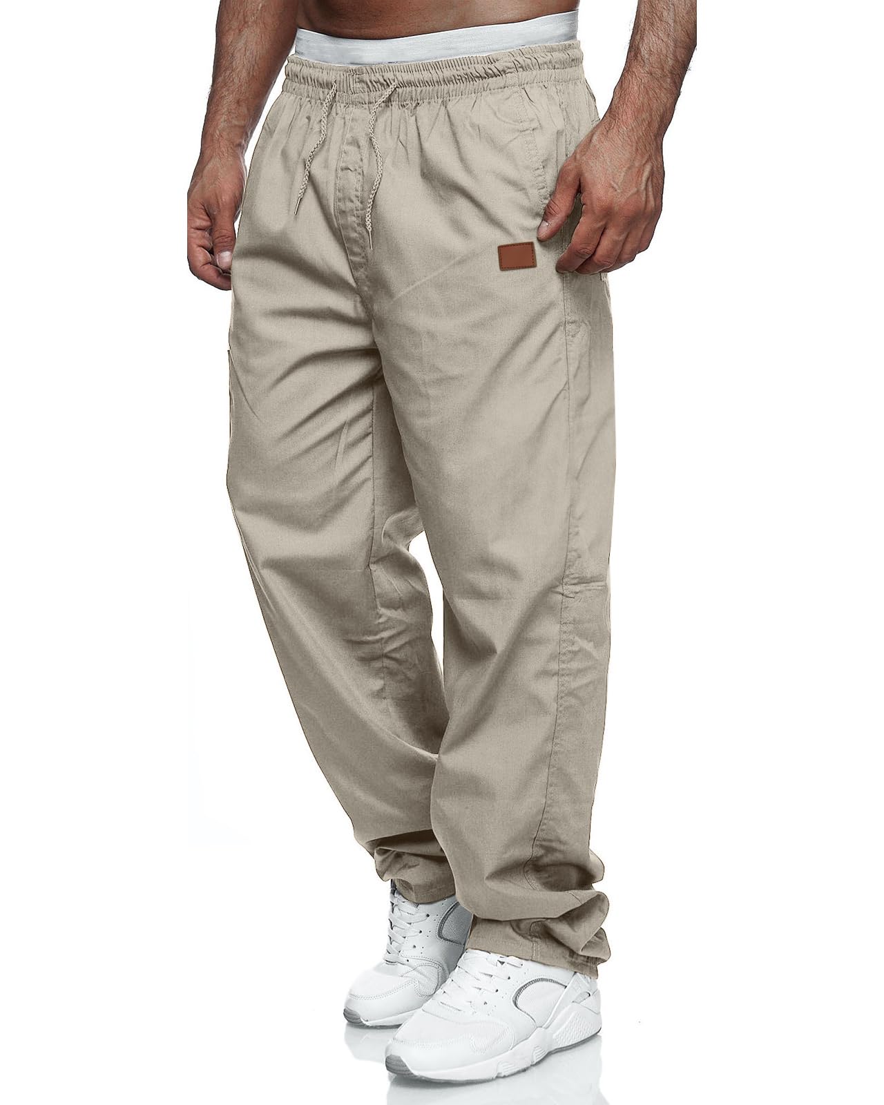 Rela Bota mens cargo pants front view with relaxed fit and versatile pocket access for everyday wear.