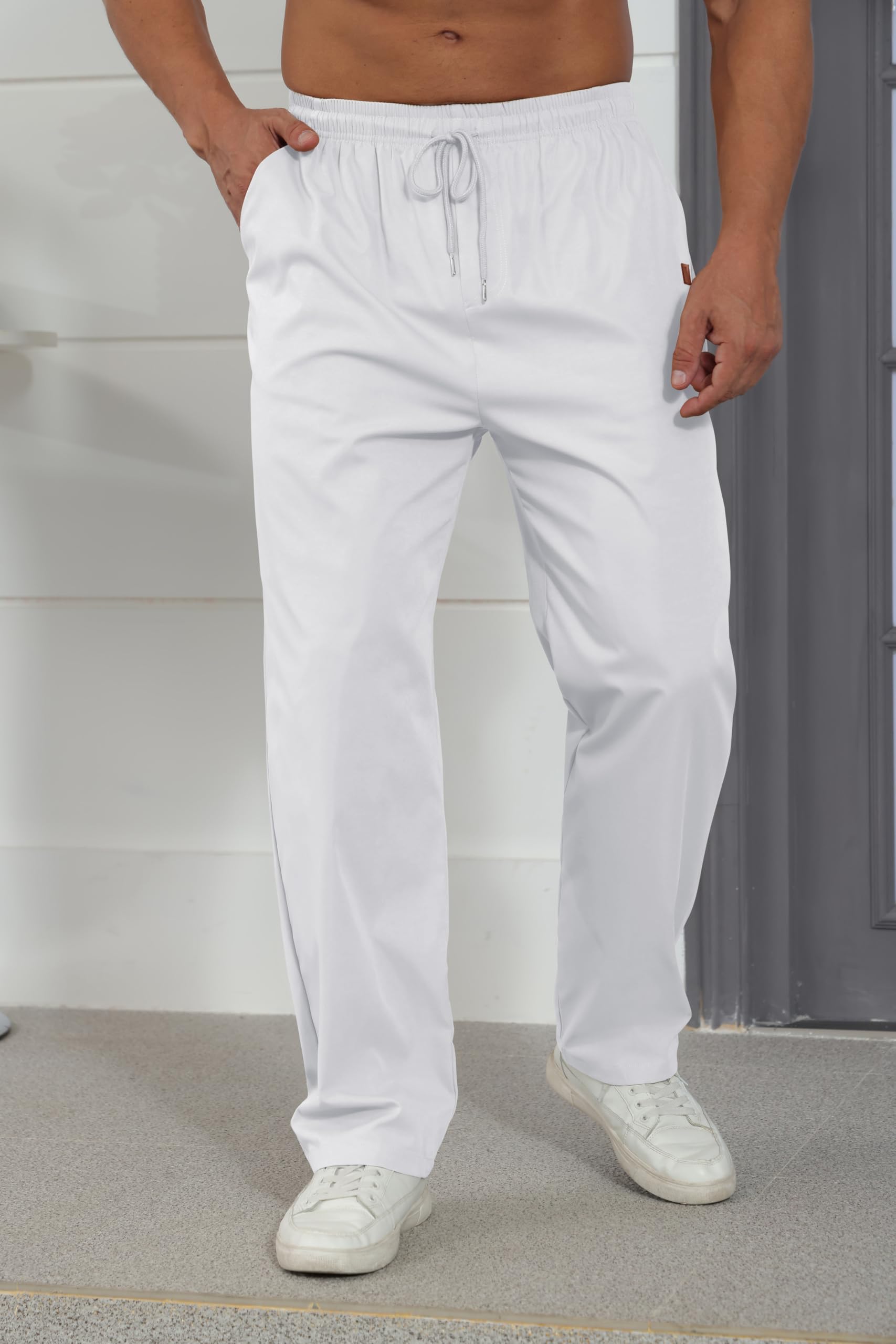 Rela Bota jogger pants feature leather label detail for premium street style.