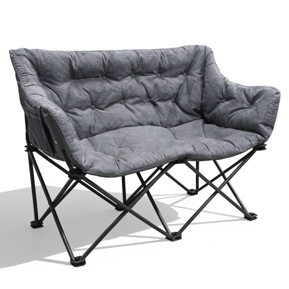 RELAX FIELD double camping chair set up outdoors for two adults, ideal for shared campsite seating