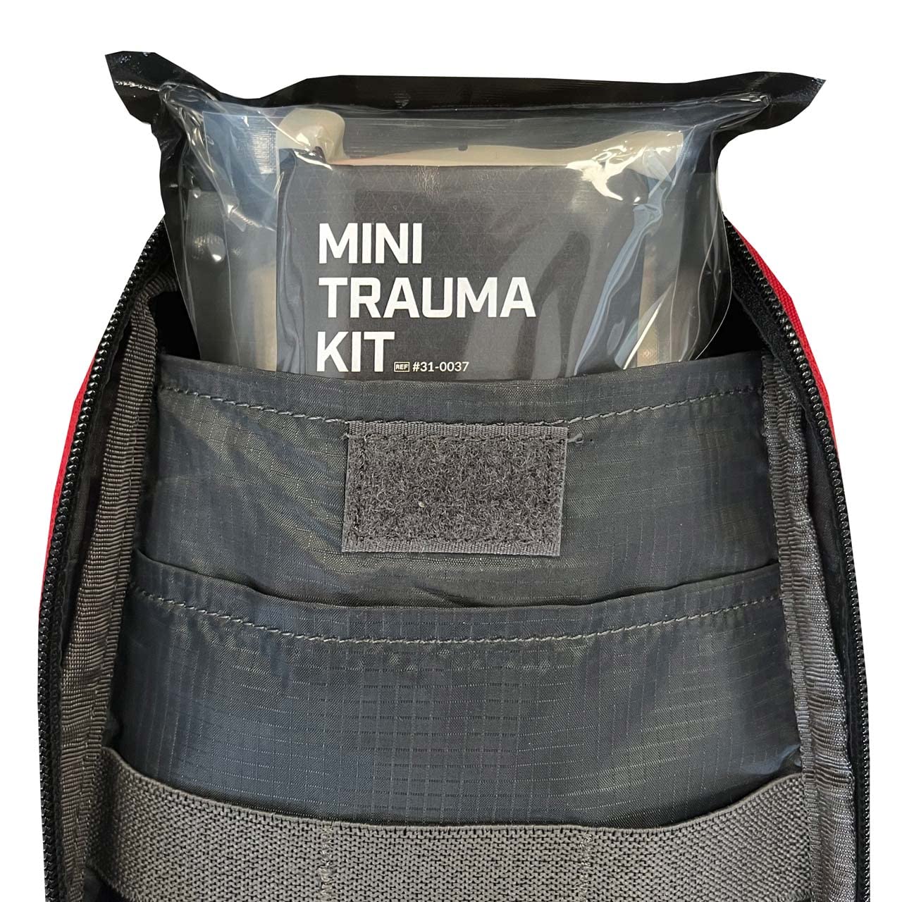 Rescue Essentials Mini TK kit in-use photograph shows three-piece kit action