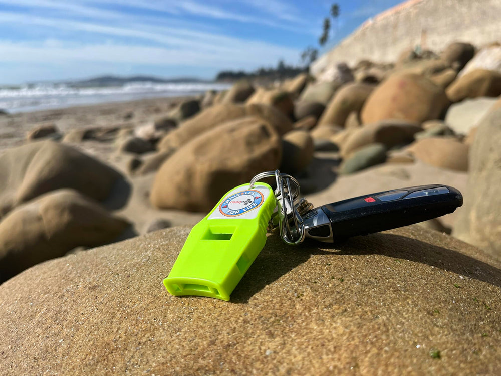 Universal locking clip keeps RESQME whistle within reach during activities.