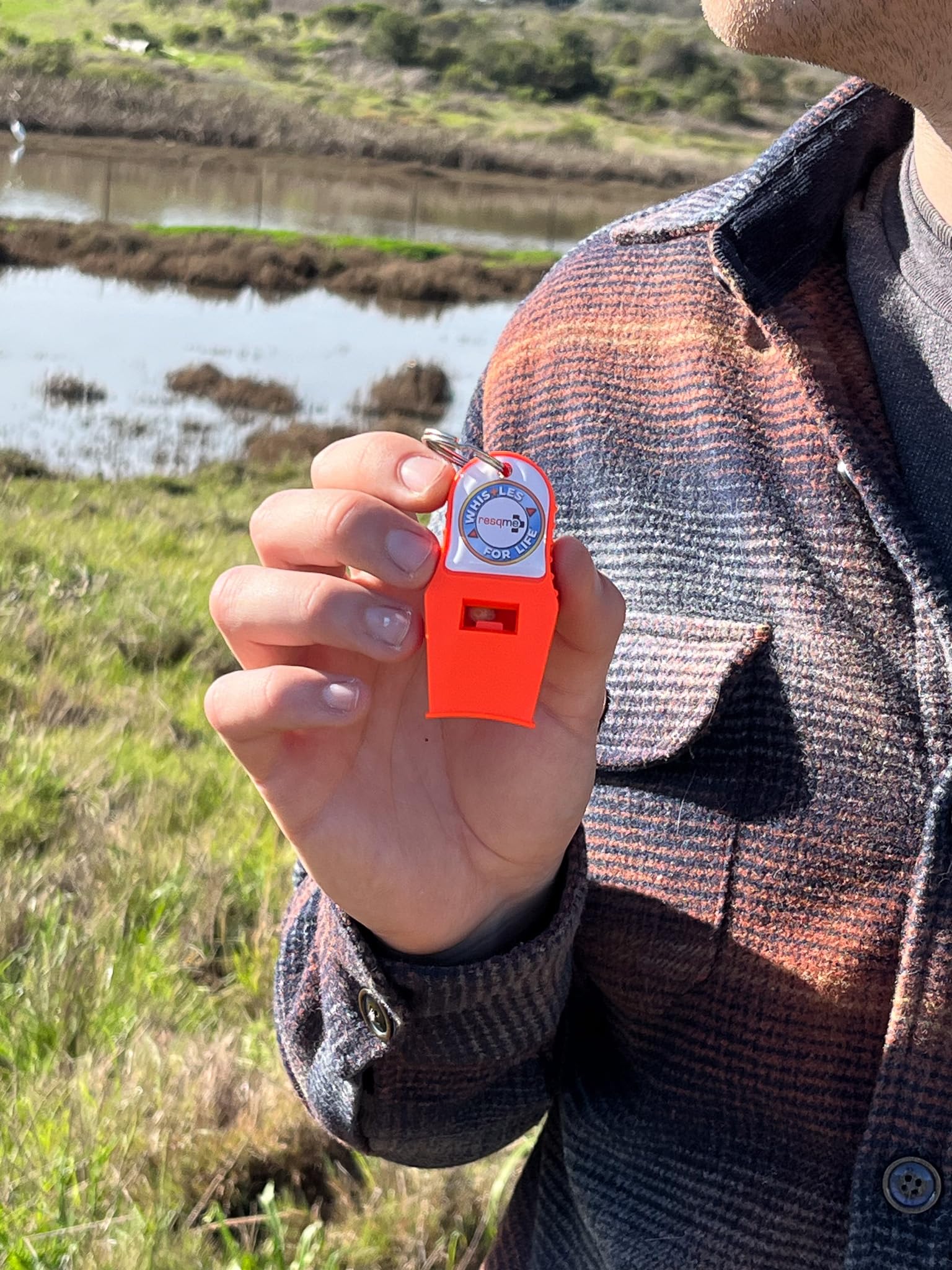 Waffle grip on RESQME Whistles for Life for secure handling in any weather