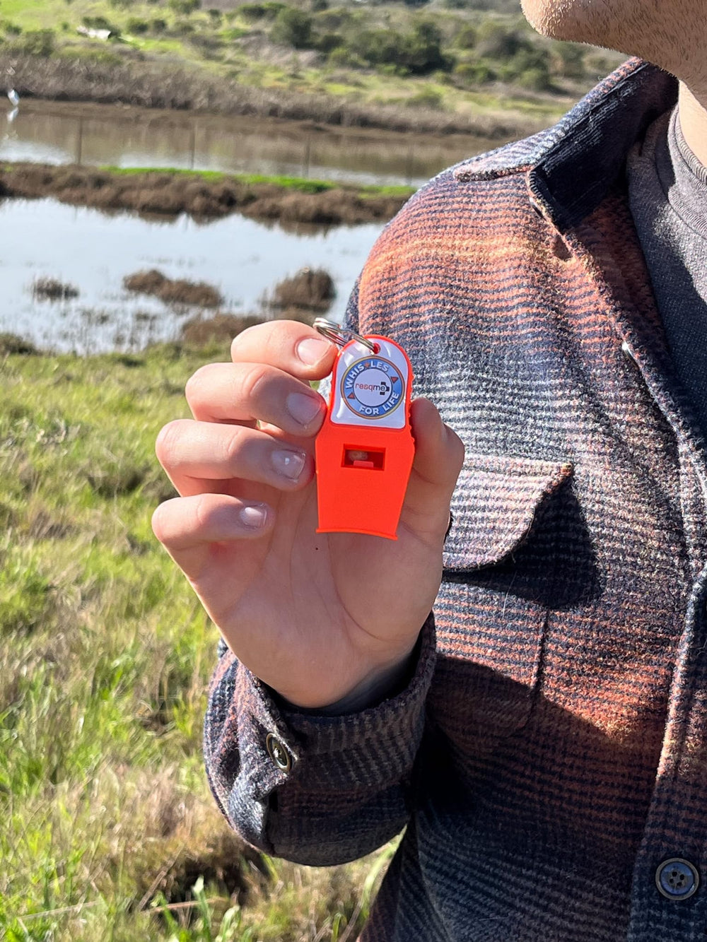 Waffle grip on RESQME Whistles for Life for secure handling in any weather