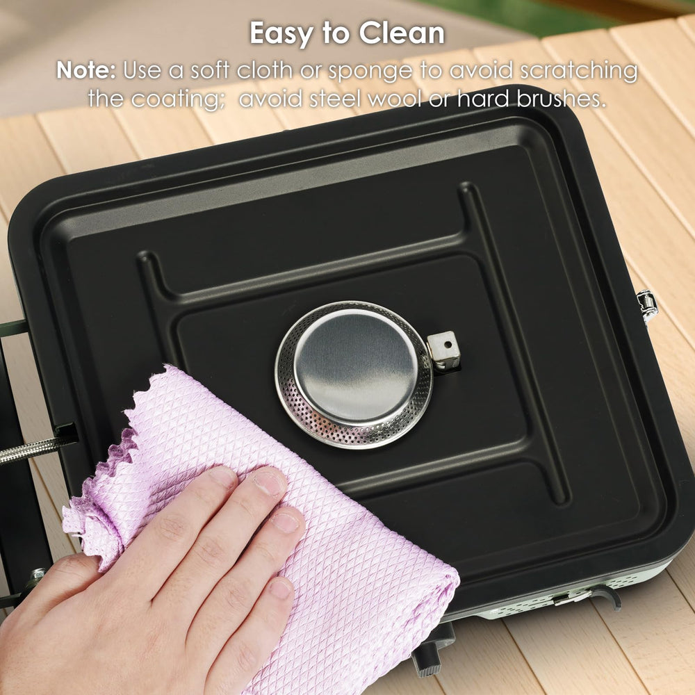 RexTact portable camping stove outdoors during sunset cooking scene.