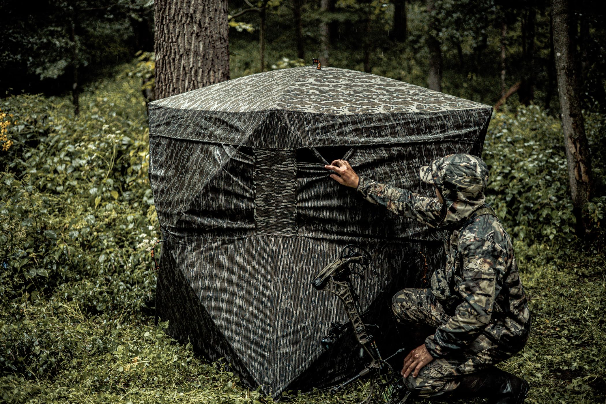 Rhino Outdoors see-through blind enables broad perimeter awareness.