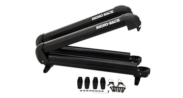 Multiple skis secured on Rhino-Rack SKI ARM4PR, illustrating large capacity