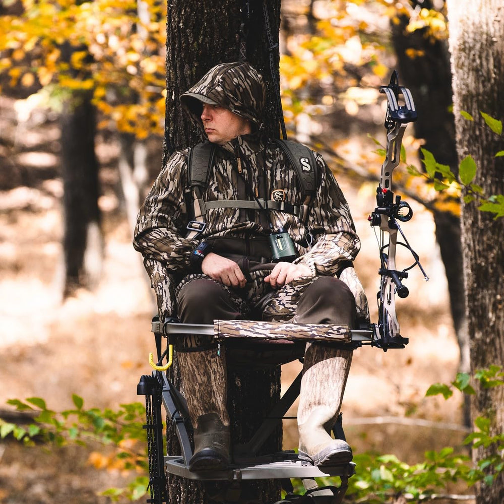 Seat lowered with front bar used as a gun rest for rifle hunting