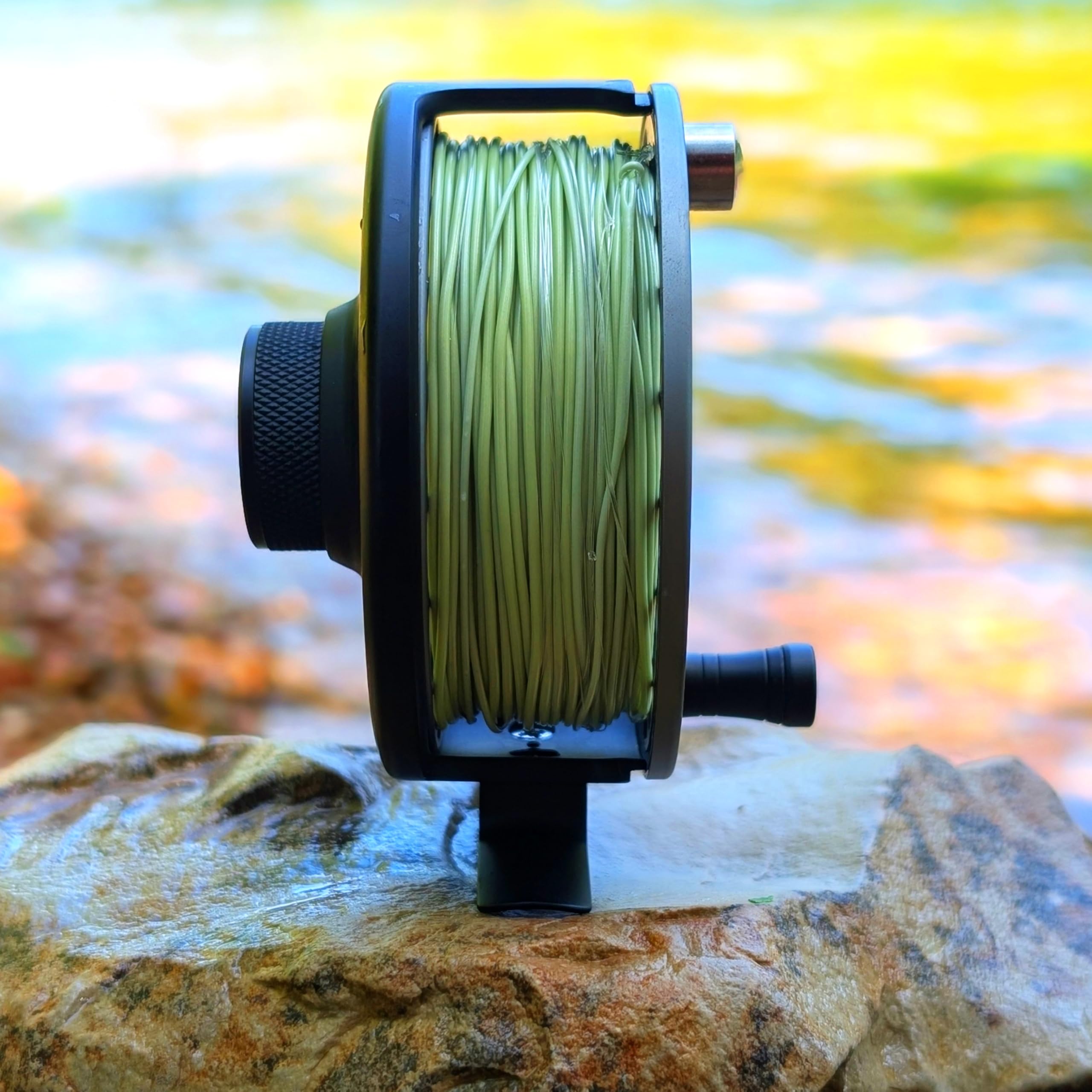 RIFT Breach v2 reel with line loaded, ready for immediate casting.