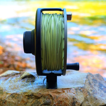 RIFT Breach v2 reel with line loaded, ready for immediate casting.