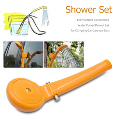 Riloer 12V camp shower pump powering a steady outdoor spray