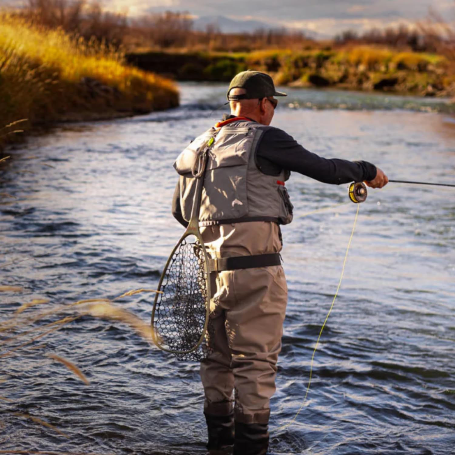 RIO Mainstream Trout DT3F Lemon Green cast in calm river emphasizes reliable turnover.