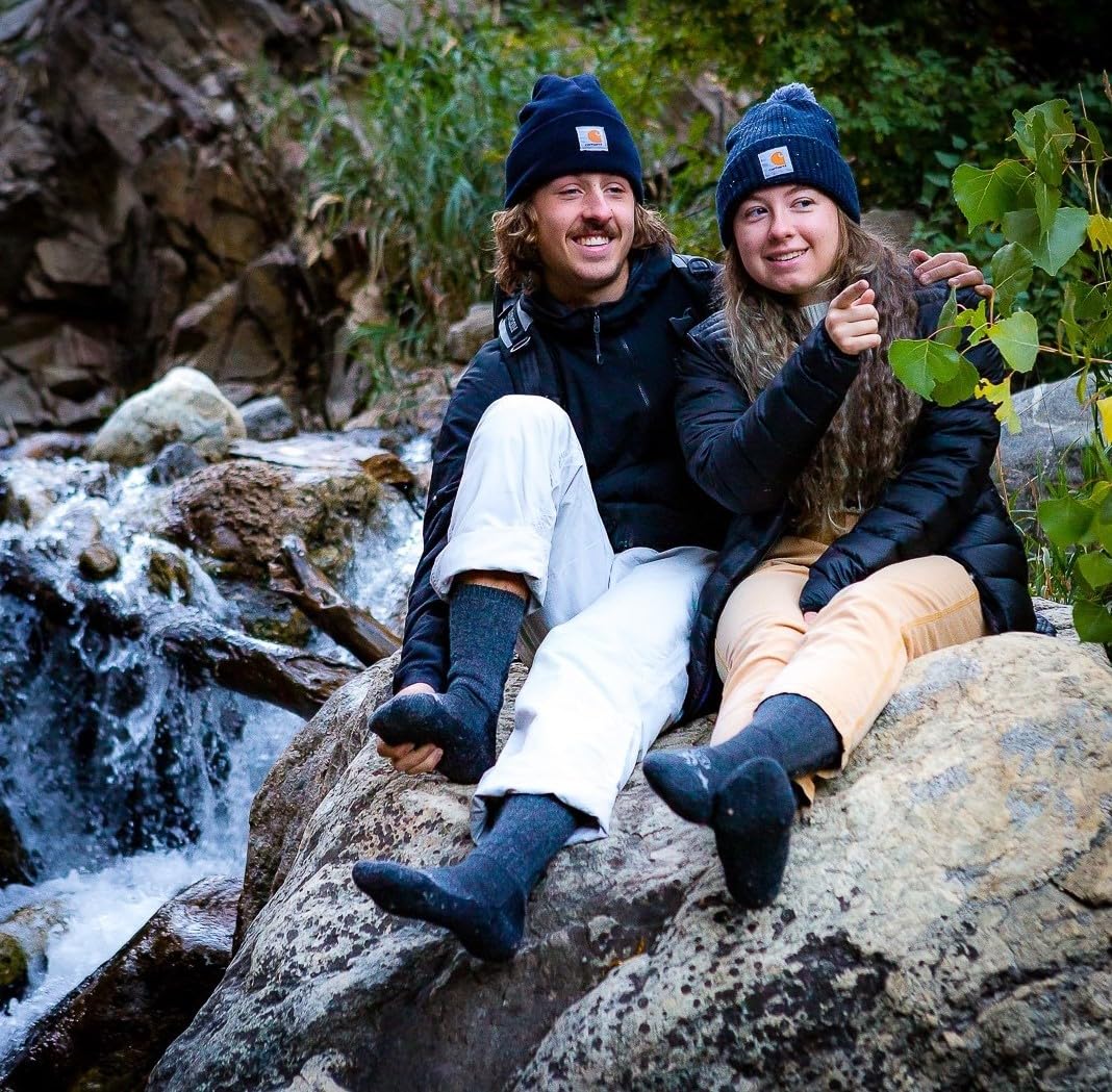 Rockagator merino hiking sock on boot silhouette for all-day wear.