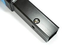 RockyMounts 8-inch LS hitch extension lock pod detail with rubber dust shutter.