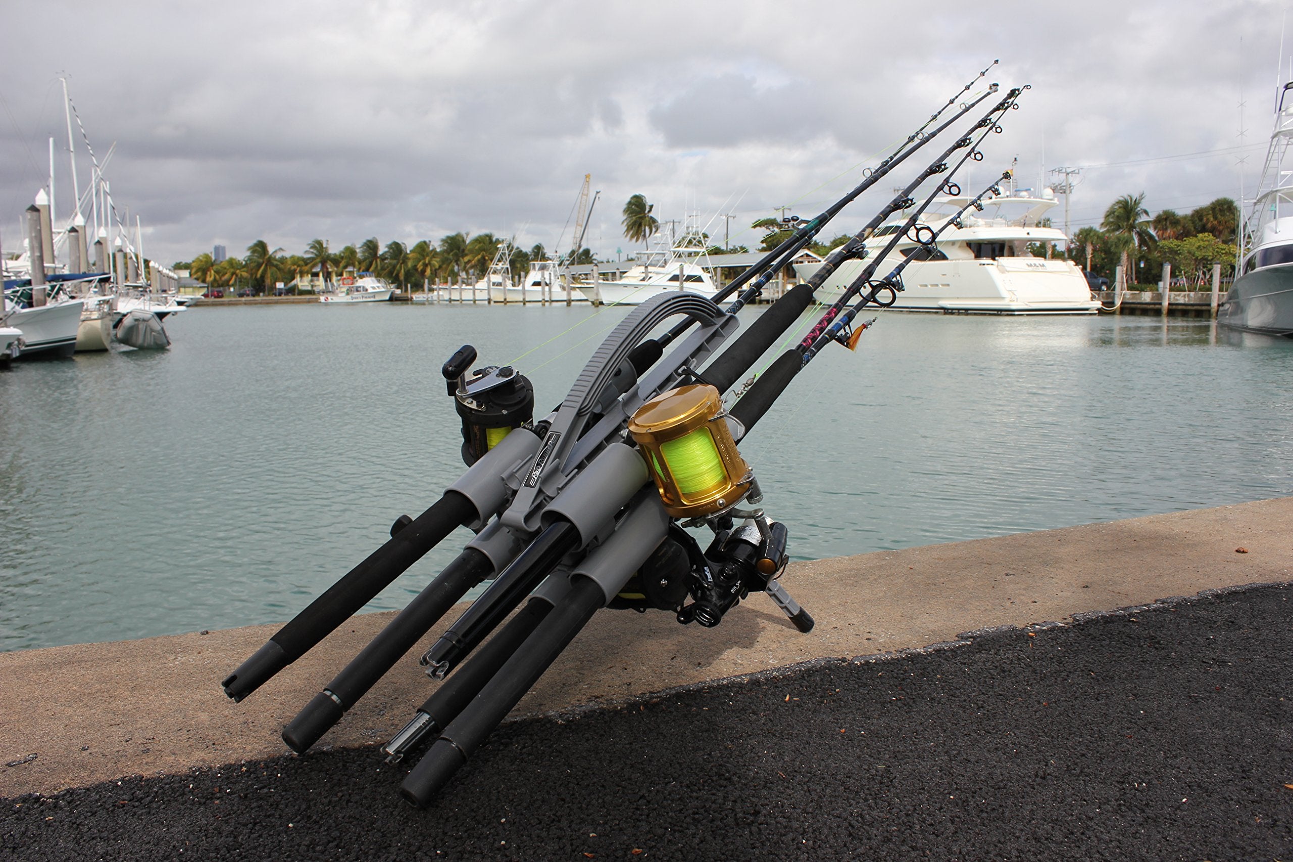 Bungee cords securing rods and evenly spaced rod tips during transport