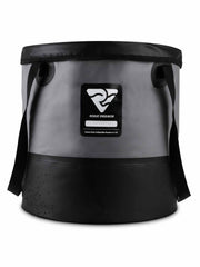 Rogue Endeavor collapsible bucket in use near water for camping and cleaning tasks.