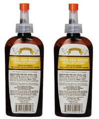 Rooster Booster Pick No More bottle and applicator for effective poultry peck control.