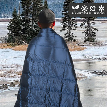 ROSE FEATHER blue blanket adds a calming touch to outdoor adventures.