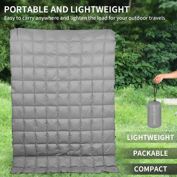 ROSE FEATHER down camping blanket packable design fits in a compact carry bag.