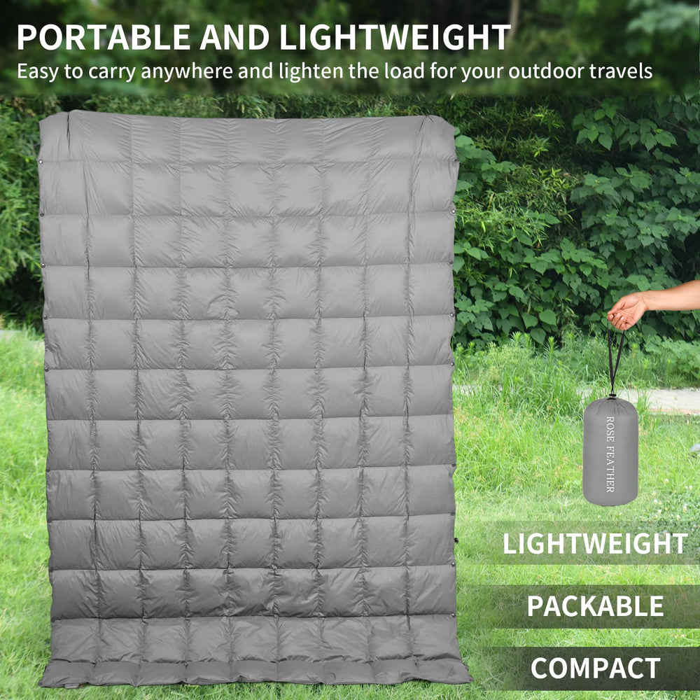 ROSE FEATHER down camping blanket packable design fits in a compact carry bag.