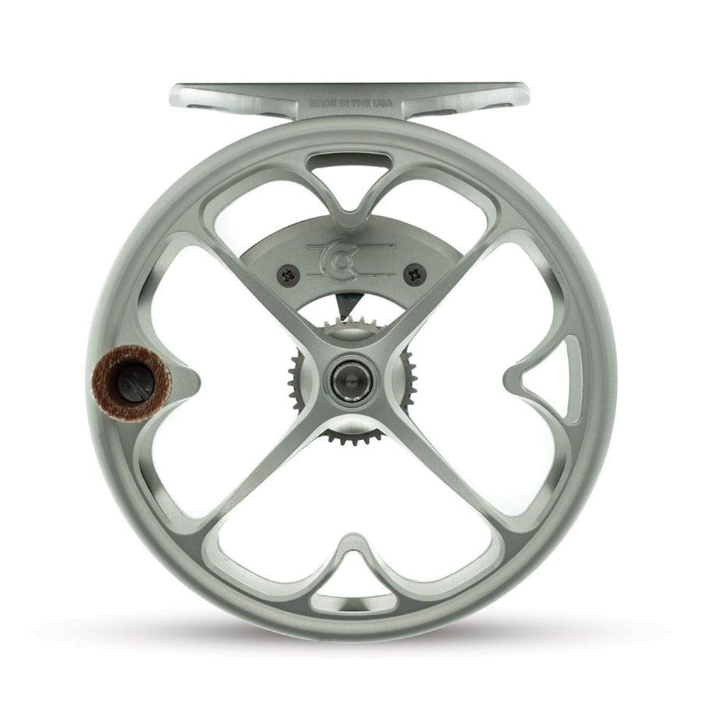 Ross Reels TIEMCO Colorado matte platinum 4/5 reel side view; ergonomic grip for all-day casting.