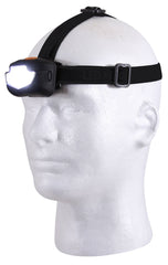 Rothco headlamp with side lights for night navigation.
