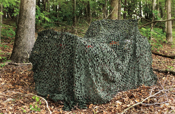 Rothco camouflage net with attached mesh for structure and anchoring