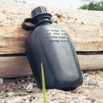 Rothco canteen compatible with GI-style covers for easy carry.