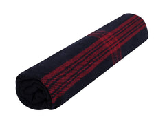 Rothco striped blanket camping-use beside tent at dusk