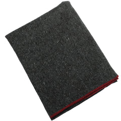 Rothco Wool Rescue Blanket demonstrates fire-retardant feature for outdoor safety.