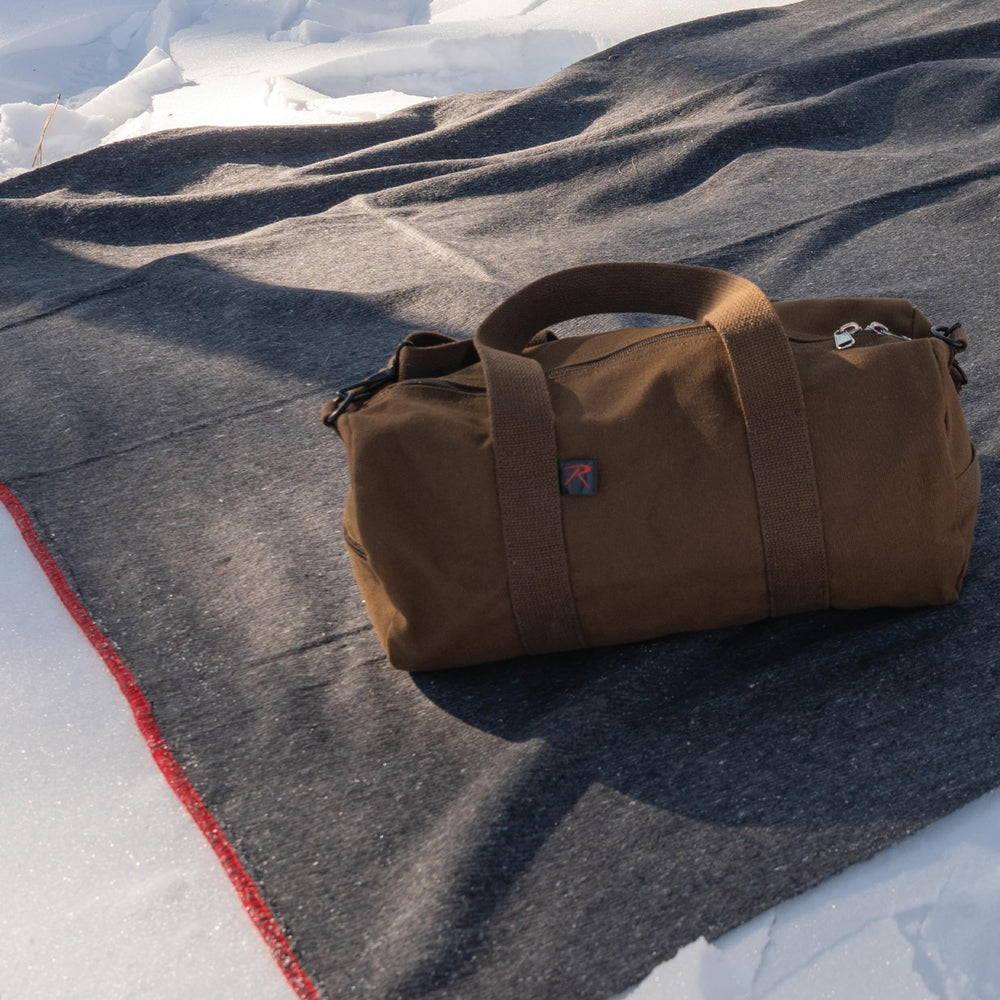 Rothco Wool Rescue Blanket shows compact, durable fabric for travel.