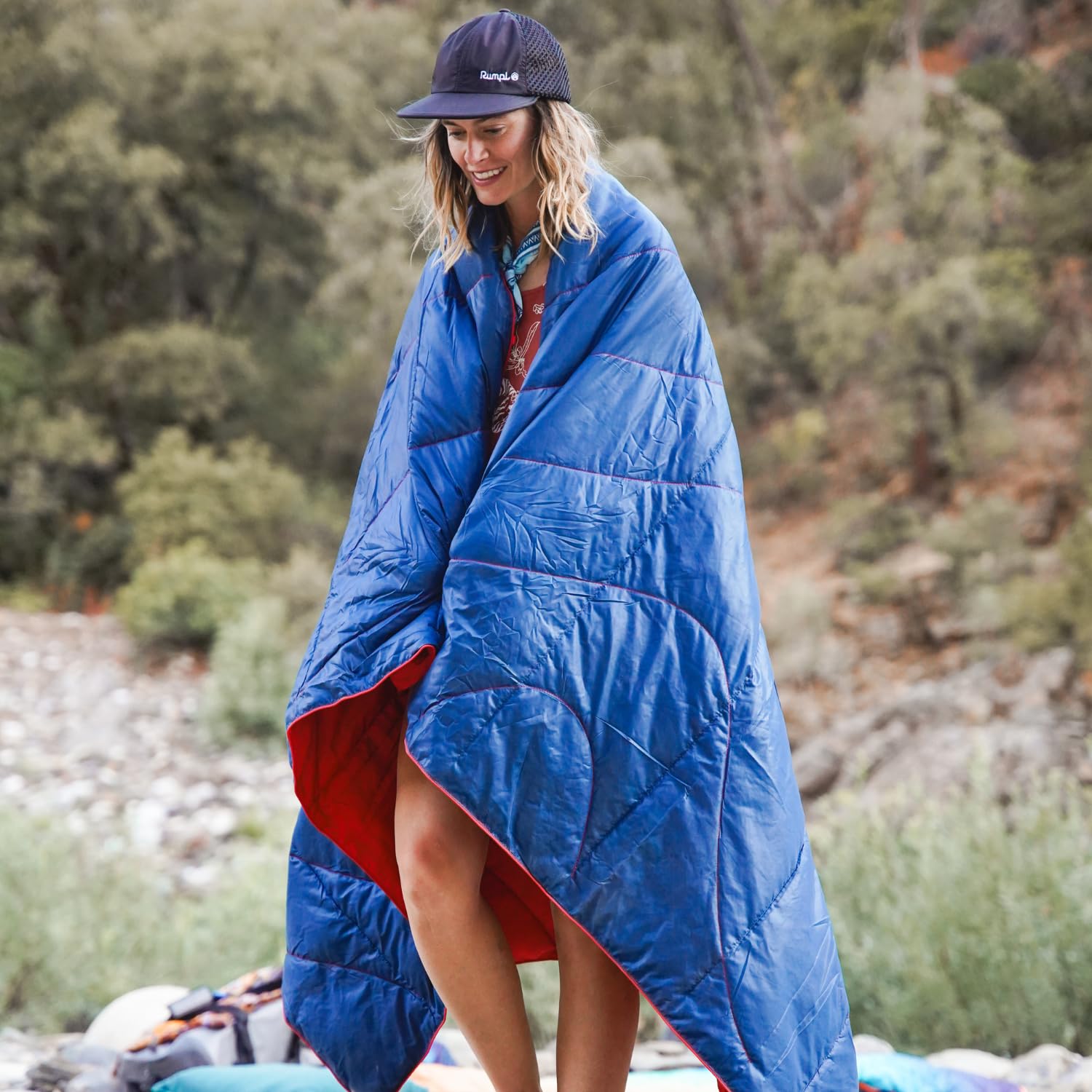 Rumpl Backcountry Puffy Blanket opened flat provides 52x75 inches of warmth and ground coverage.