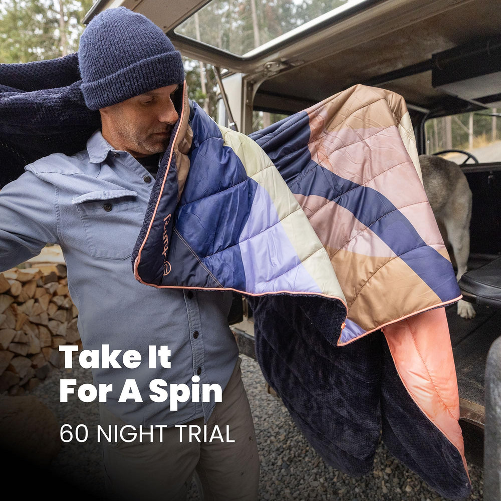 Rumpl fleece puffy blanket Deepwater machine-washable for easy care.