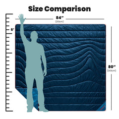 Rumpl fleece puffy blanket VersaWeave shell close-up highlights outdoor durability for rugged adventures.
