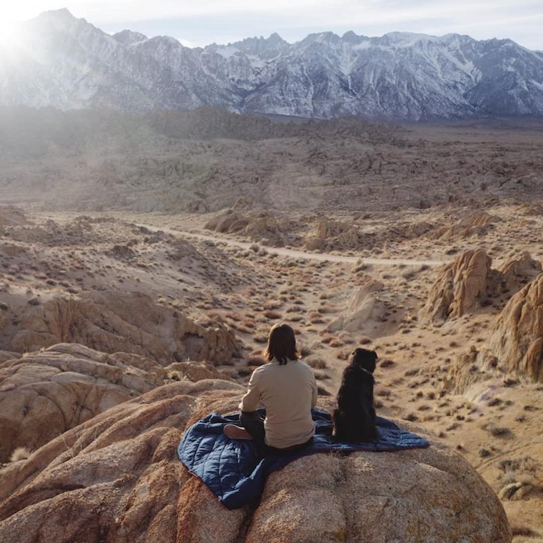 The Rumpl Original Puffy 2P blanket shows water-repellent finish on fabrics.