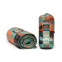 Rumpl Original Puffy Blanket opened to 52x75 for full coverage outdoors.