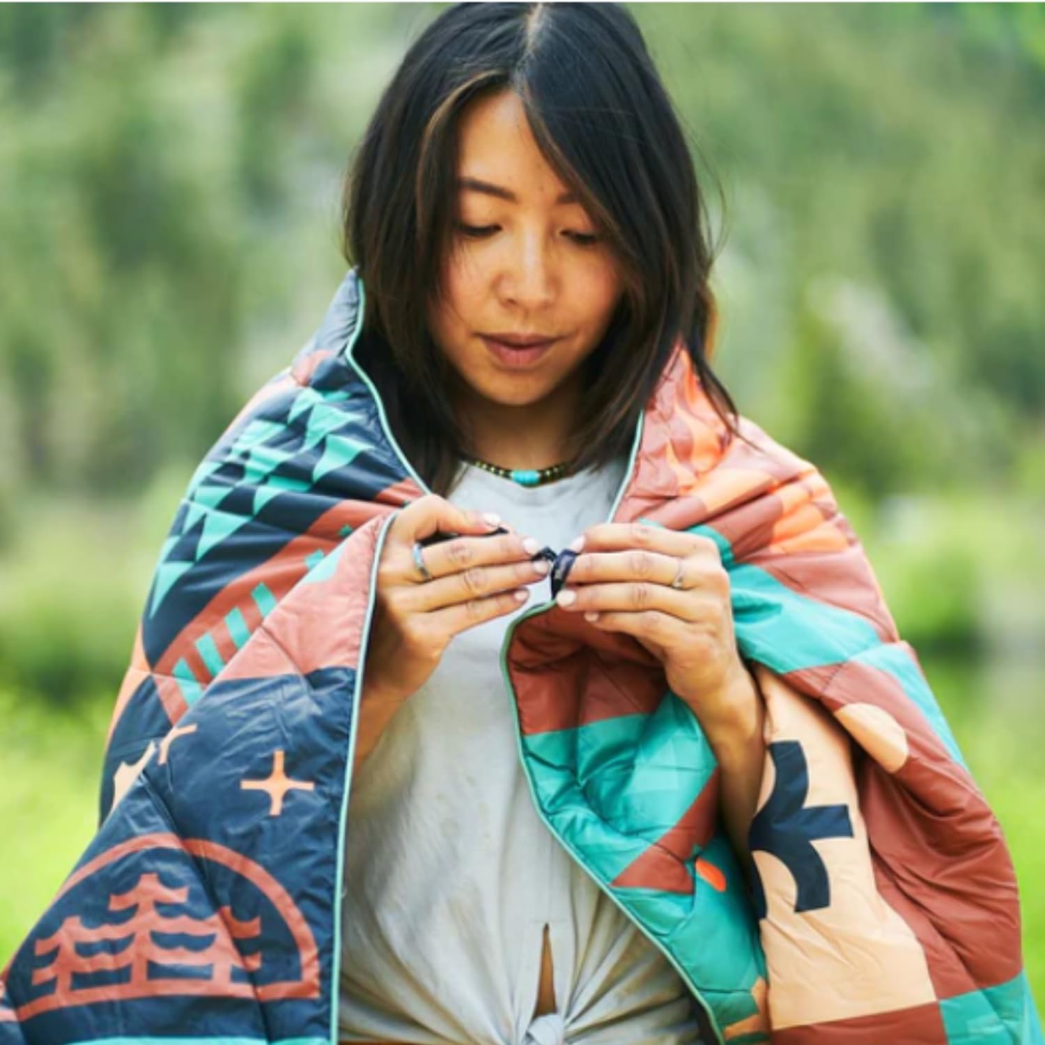 Rumpl Original Puffy Blanket packs to 7x16 for easy carry.