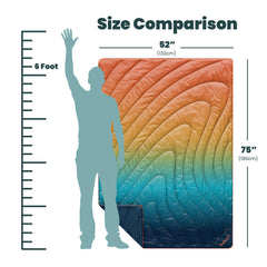Rumpl Original Puffy Blanket packed in roll-top sack for easy carrying