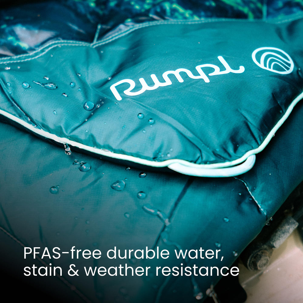 Rumpl Original Puffy Yosemite blanket with DWR coating resists dirt and moisture outdoors.