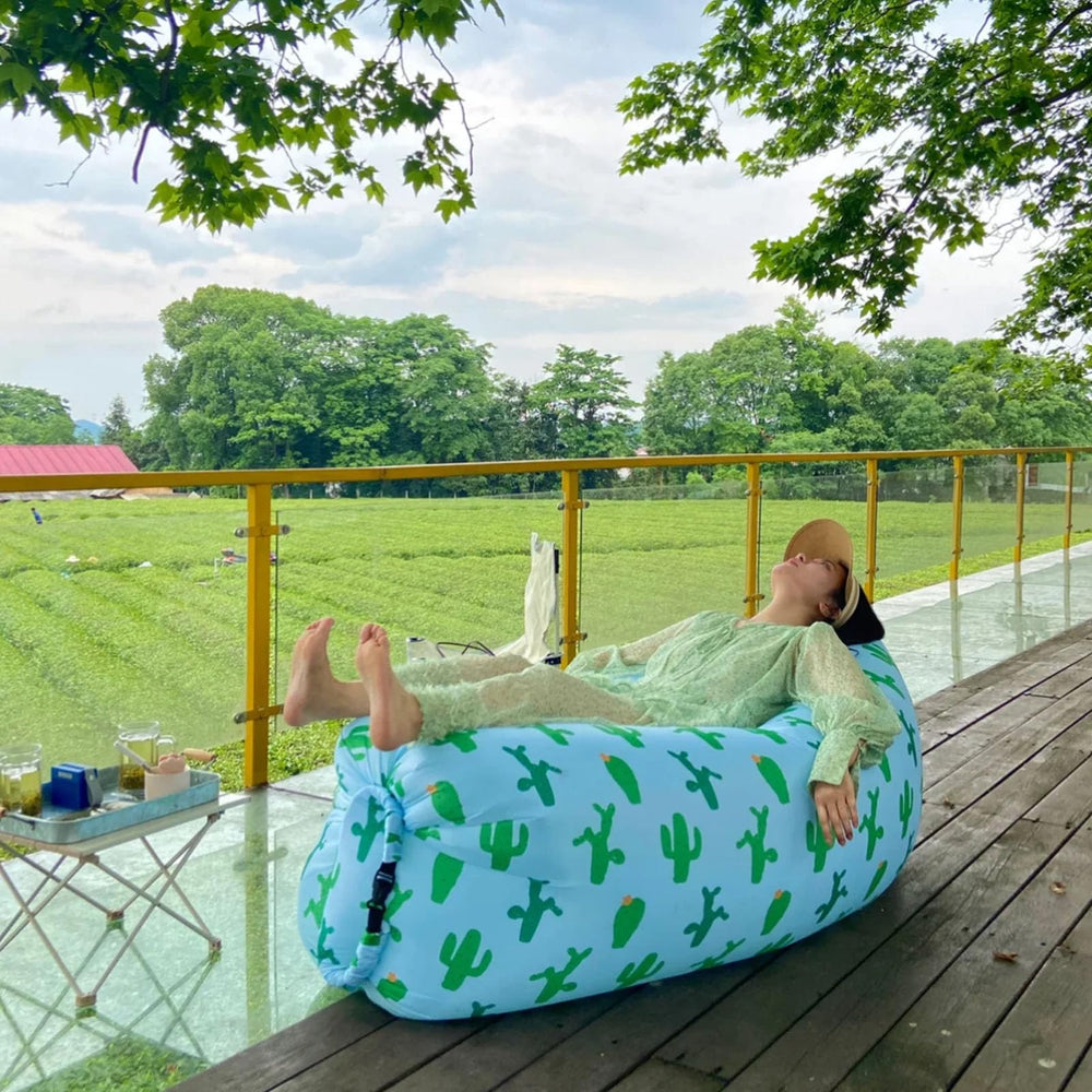 Rwoora portable festival couch outdoors for easy seating.